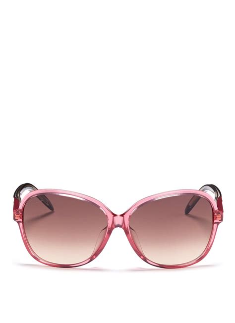 pink oversized Gucci sunglasses